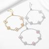 New Arrival Hollowed-Out Lucky Four-Leaf Clover Pull-Down Bracelet In Natural Mother-of-Pearl for Women, Small Luxury Accessories