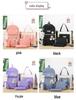 High-End Canvas Backpack for Junior High School Girls - Four-Piece Set