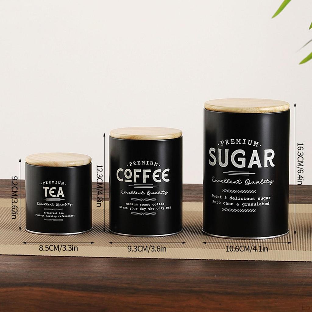 Композиция из 3 банок для хранения кофе, чая и сахара на кухонной столешнице