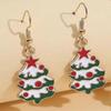 Beautiful Christmas tree earrings decorated with snow, red balls, and stars