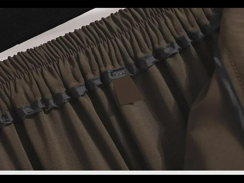 Женская высококачественная черная юбка с разрезом — средняя длина, высокая талия, облегающий крой на весну и осень 2024 г.