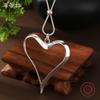 Новое полое преувеличенное ожерелье с длинной подвеской в виде любви, женский полый универсальный длинный кулон в форме сердца