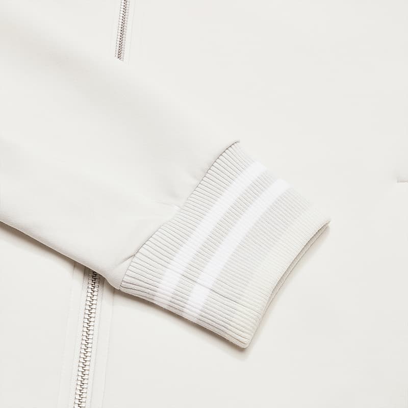 Fila Теннисная мода Минималистичная личность Трендовая повседневная Удобная Универсальная вязаная куртка Мужские куртки Антилопа-белый A11M543511FIV