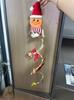 Gingerbread glowing three-dimensional Christmas door decoration in color