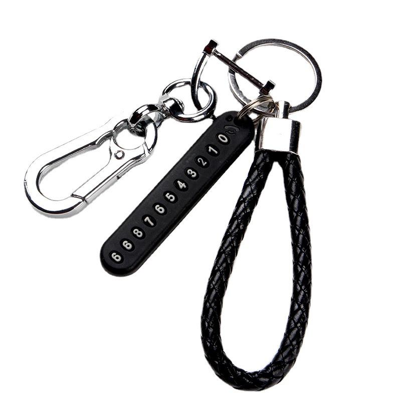 Men’s Leather Cord Keychain with Metal Anti-Lost Phone Tag and Stainless Steel Car Pendant.