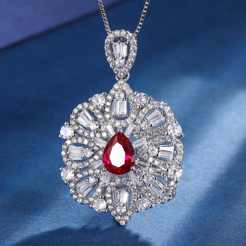 Ювелирные изделия Медное дно Золотое покрытие Имитация ветра Сокровище Капля воды Полый кулон Ожерелье Главный камень 7 * 9