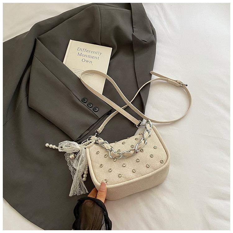 Trendy punk style willow nails single shoulder armpit bag women's 2025 summer new trendy personality bright diamond locomotive handbag