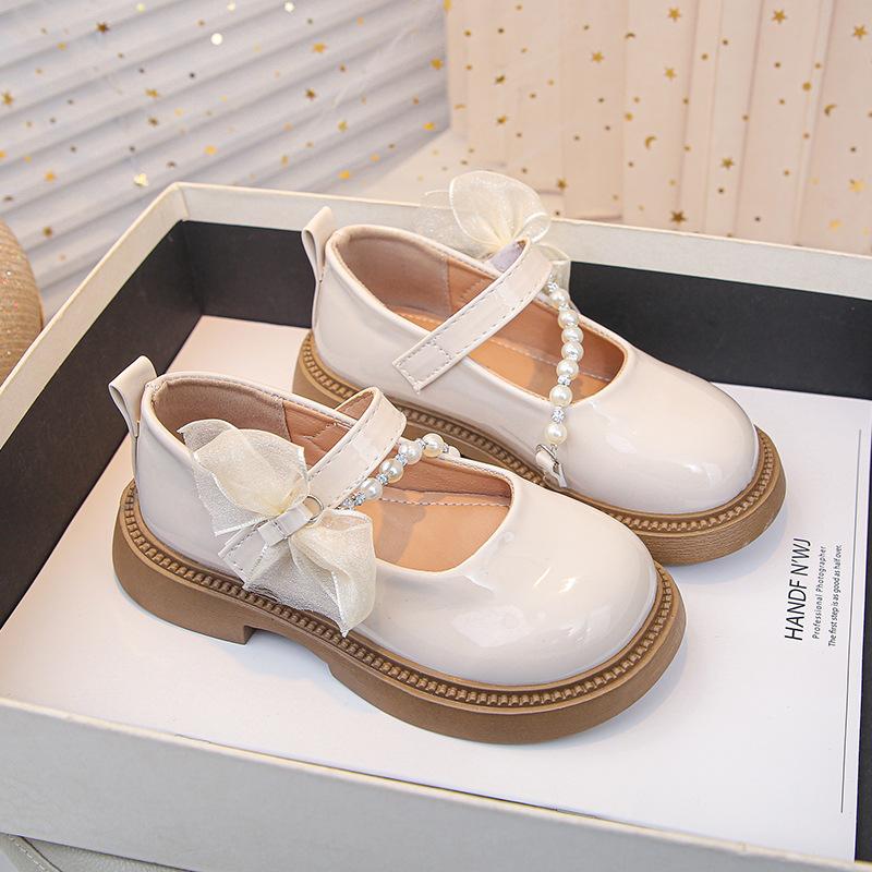 Spring new collection of children's shoes: fashionable bow-knot princess flats for girls, available in medium and large sizes, with pearl