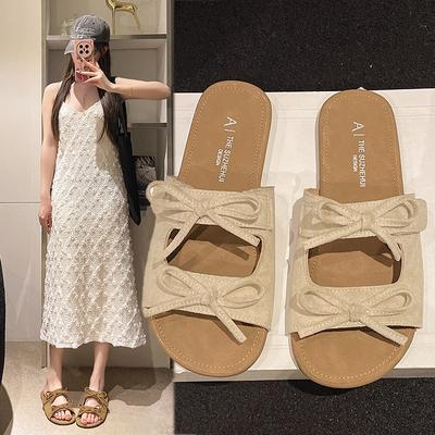 Французский сказочный стиль мягкая подошва тапочки с бантом женские летние 2025 новые на плоской подошве универсальные приморские пляжные сандалии