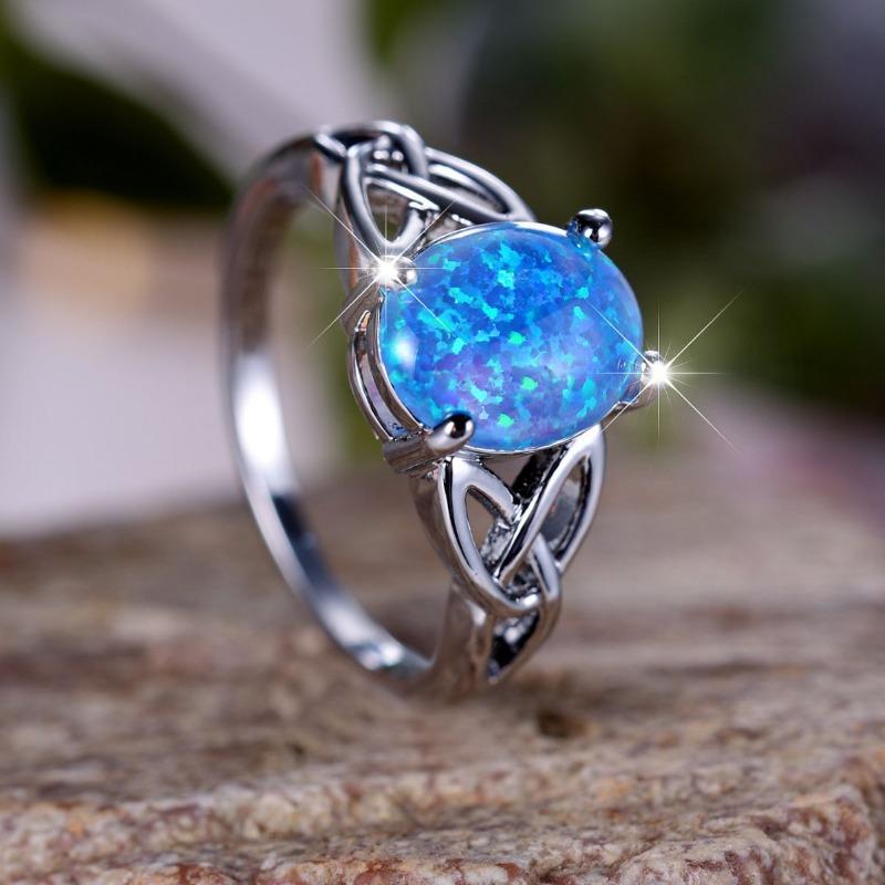 Модное кольцо-крест с синей окантовкой в форме яйца для поездок на работу