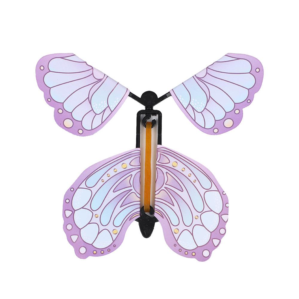 1Pcs Magic Wind Up Flying Butterfly in The Book Rubber Band Powered Magic Fairy Flying Toy Great Surpris Gift Party Favor