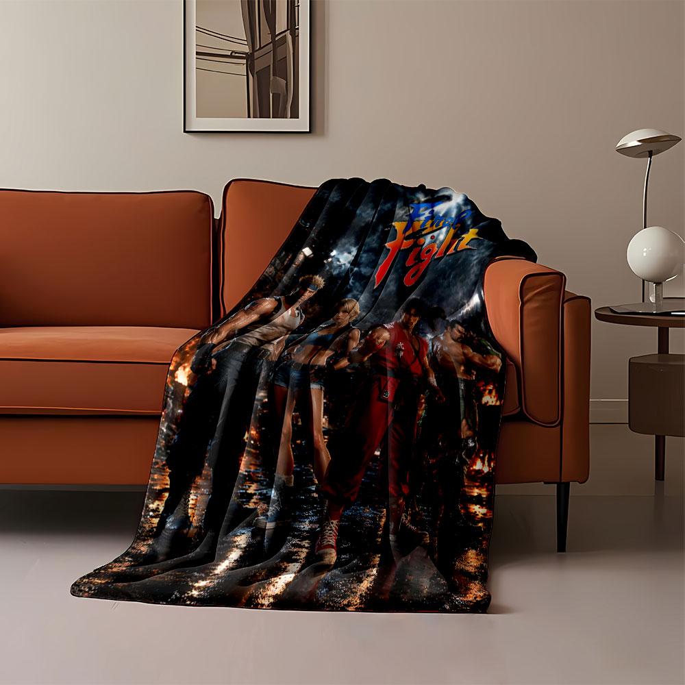 Four muscular characters in martial arts poses amid a fiery background. for all seasons blanket lunch break throw gift