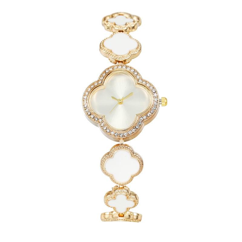 Модные часы-браслет с лепестками и клевером для женщин, кварцевые, оптом от производителя