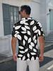 Men'S Short-Sleeve Polo Shirt with a Flat Digital Print Pattern - Textured-Free - Featuring a Black Background with White Leaf Designs. This Stylish