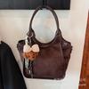 Премиальная нишевая сумка с чувством, женская осенне-зимняя 2025, новая матовая ретро сумка через плечо, популярная портативная сумка-ведро