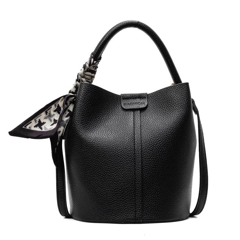 Korean fashion and simplicity Ou Ruofeng casual versatile portable bucket bag women's commuting advanced sense messenger child and mother bag