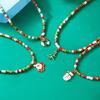 Christmas Themed Bead Necklace Featuring Santa Pendant Festive Color Jewelry For Holiday Gatherings And Outfit Styling