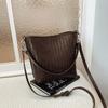 Niche woven pattern bag women's new simple bucket bag casual commuter shoulder messenger bag
