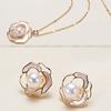 Two-piece Pearl Jewelry Set, Featuring Freshwater Pearls and Camellia Motifs, with Near-perfect Round Pearls, Including Earrings and a Pendant
