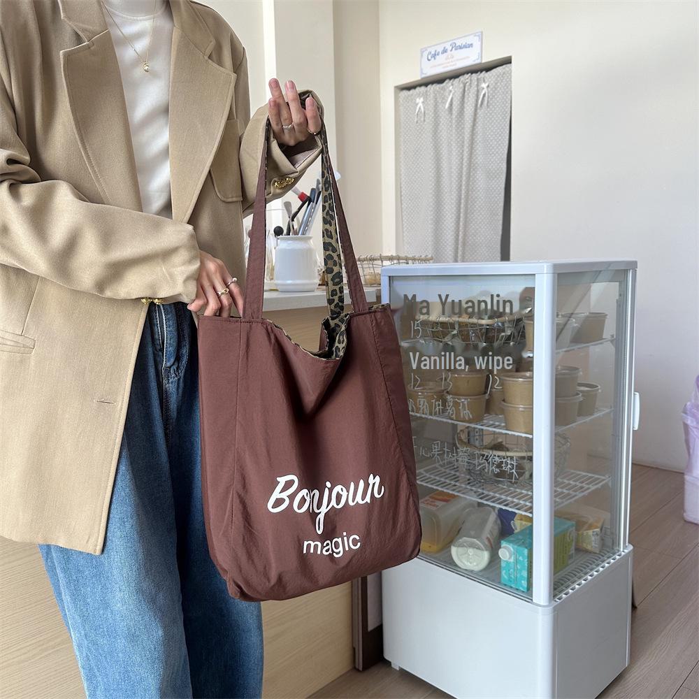 Холщовая сумка с леопардовым принтом: Женская сумка через плечо большой вместимости, коллекция Осень/Зима 2024, новый дизайн двойной сумки.