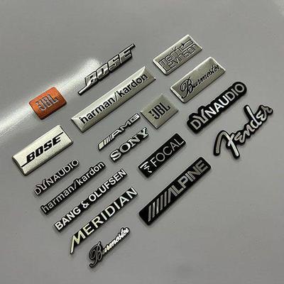 Декоративные металлические наклейки для автомобильной акустики Bose, Harman Kardon, JBL.