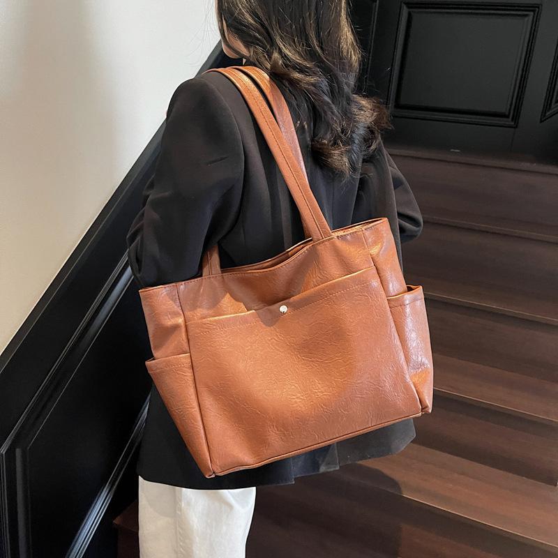 2025 лето новая зарубежная темпераментная простая сумка-тоут большой вместимости модный тренд женская повседневная сумка через плечо