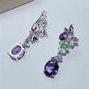 Изысканные серьги. Выполнены в виде бабочки на цветке и украшены фиолетовыми аметистами. Элегантное вечернее и свадебное украшение
