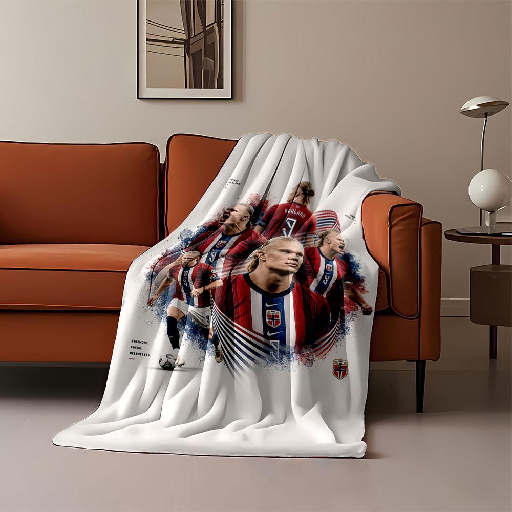 Multiple images of a soccer player in Norway's red jersey with dynamic poses. for all seasons blanket lunch break throw gift