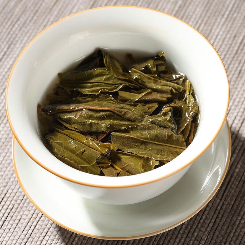 Чай пуэр Lincang Sheng Qizi, 2019 г., с ароматом древнего дерева и сливы, 357 г