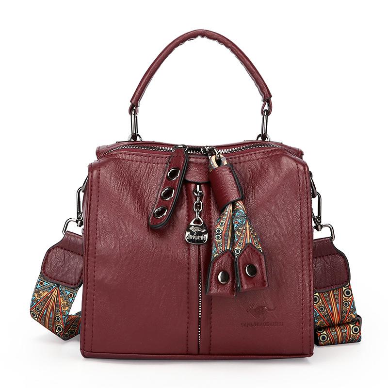 Это высококлассная женская сумочка, одноплечная сумка для поездок на работу и многослойная сумка кроссбоди большой вместимости.