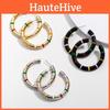 Модные геометрические серьги-кольца Осень 2021 в черном золоте и серебре
