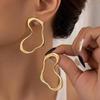 Trendy Heart-Shaped Irregular Line Earrings: Stylish, Simple, Cold-Style Accessory for Women, Ideal for Daily Wear and Parties.