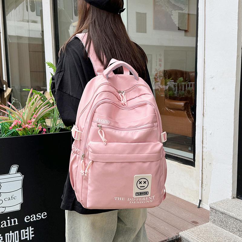 Schoolbag trendy brand burden reduction large-capacity backpack for boys and girls, school bag lightweight waterproof casual lightweight backpack
