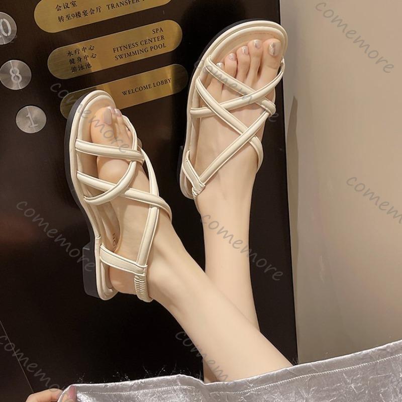 Мода Comemore 2025 Лето Новые Плоские Сандалии Женские Перекрестный Ремешок Открытый Носок Эластичная Женская Обувь Повседневные Однотонные Пляжные Мягкая Подошва Сандалии