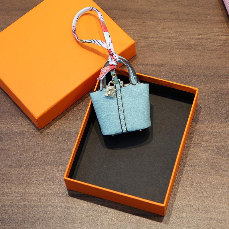 Стильный кожаный брелок и аксессуар для сумки для наушников - Милая и креативная женская модная подвеска