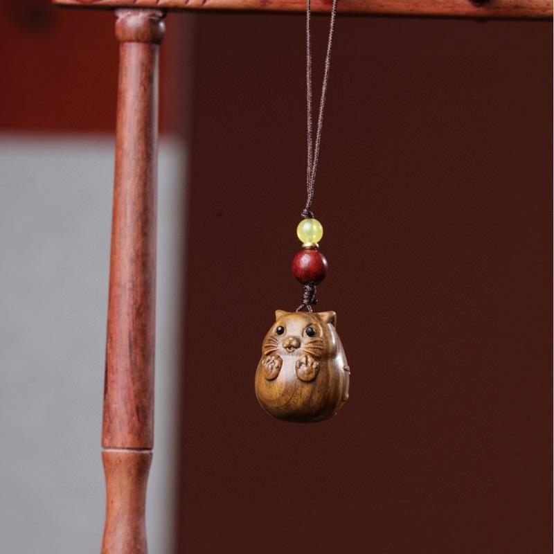 Twelve Zodiac Animal Charms Green Sandalwood Set: Rat, Ox, Tiger, Rabbit, Dragon, Snake, Horse, Sheep, Monkey, Rooster, Dog, Pig.