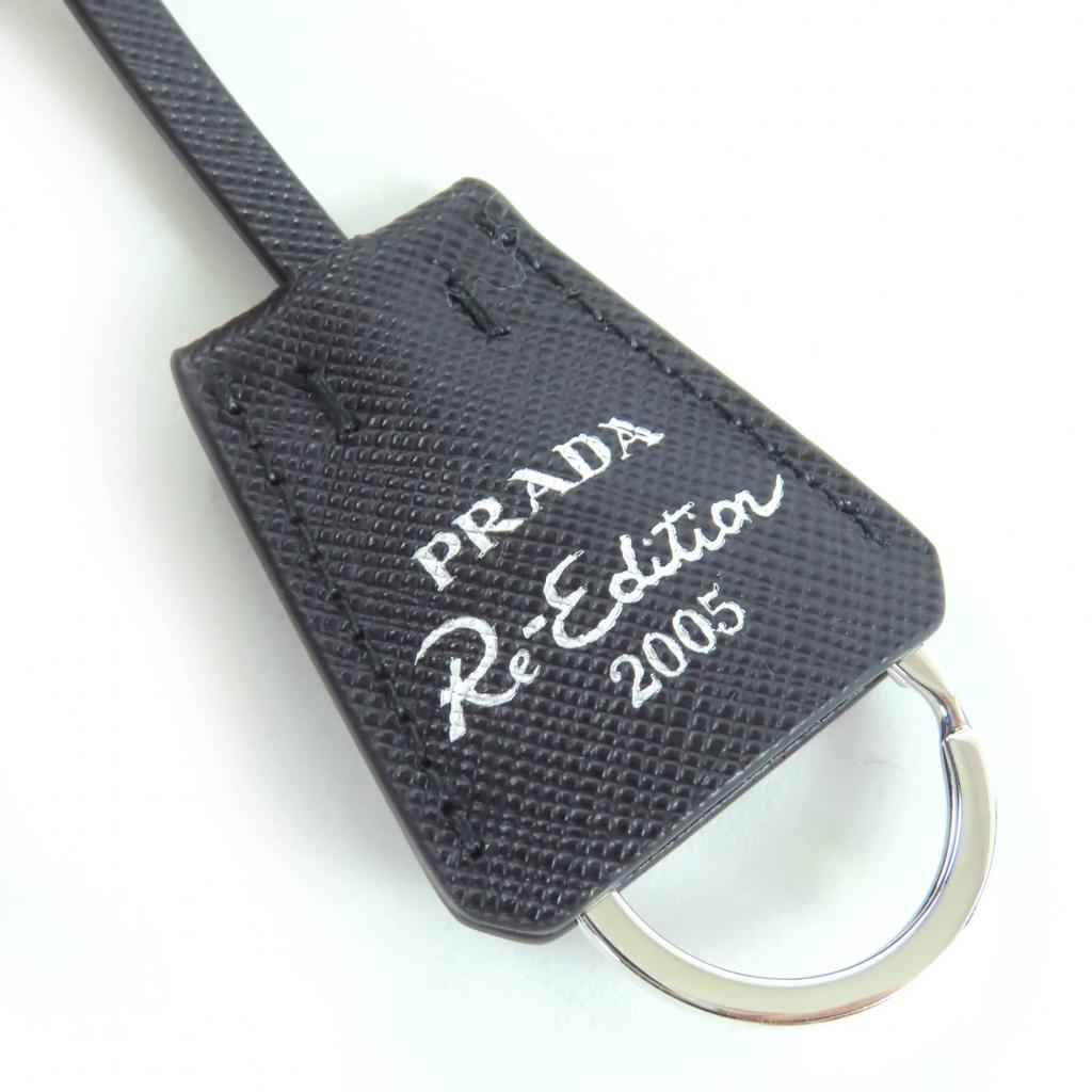 Безупречная сумка PRADA через плечо Re-Edition Логотип-треугольник 2-сторонняя с кошельком 1BH204 Б/у