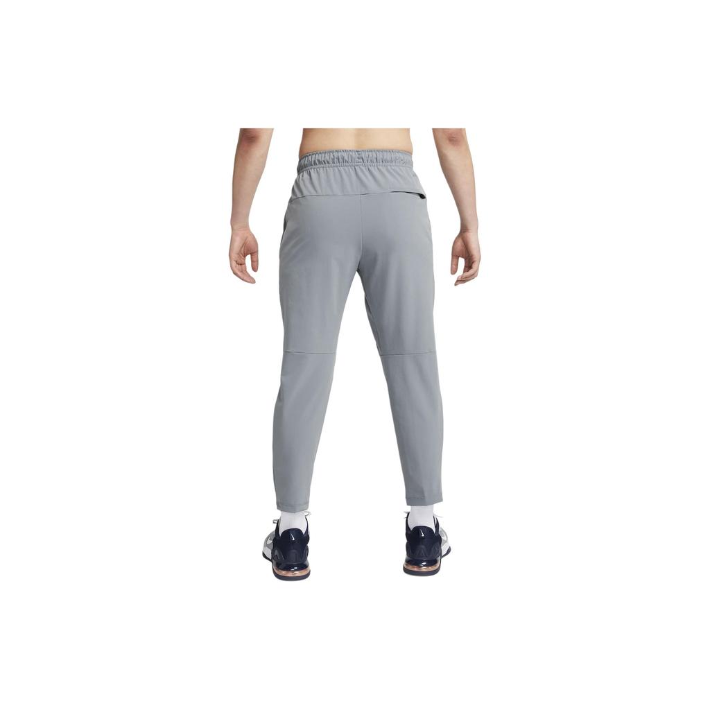 Nike Универсальные брюки прямого кроя Nike Dri-FIT Unlimited Азиатский размер Мужские Дымчато-серый Черный FB7547-084