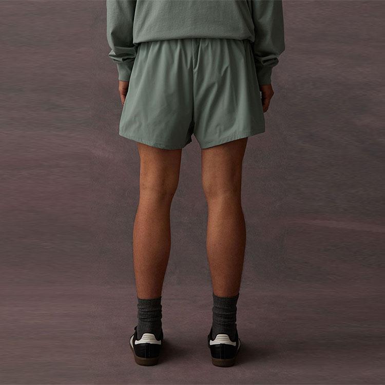 Fear of God Essentials Беговые нейлоновые шорты Платан Мужские Низ Зеленый 160BT224041F
