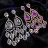 Серебряные серьги-гвоздики с кисточкой из страз: Элегантный нишевый дизайн с каплей воды для женщин