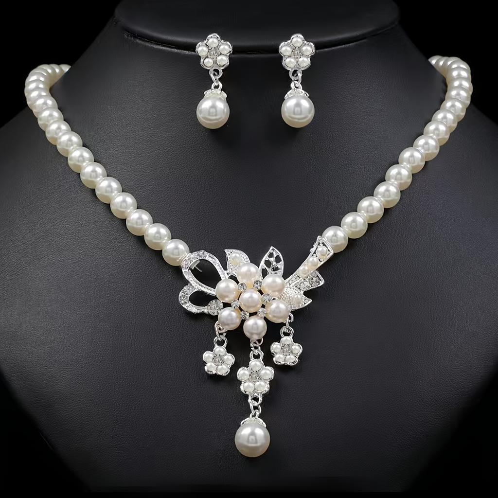 Imitation Pearl Jewelry Three-Piece Set An imitation pearl necklace A pair of faux pearl earrings