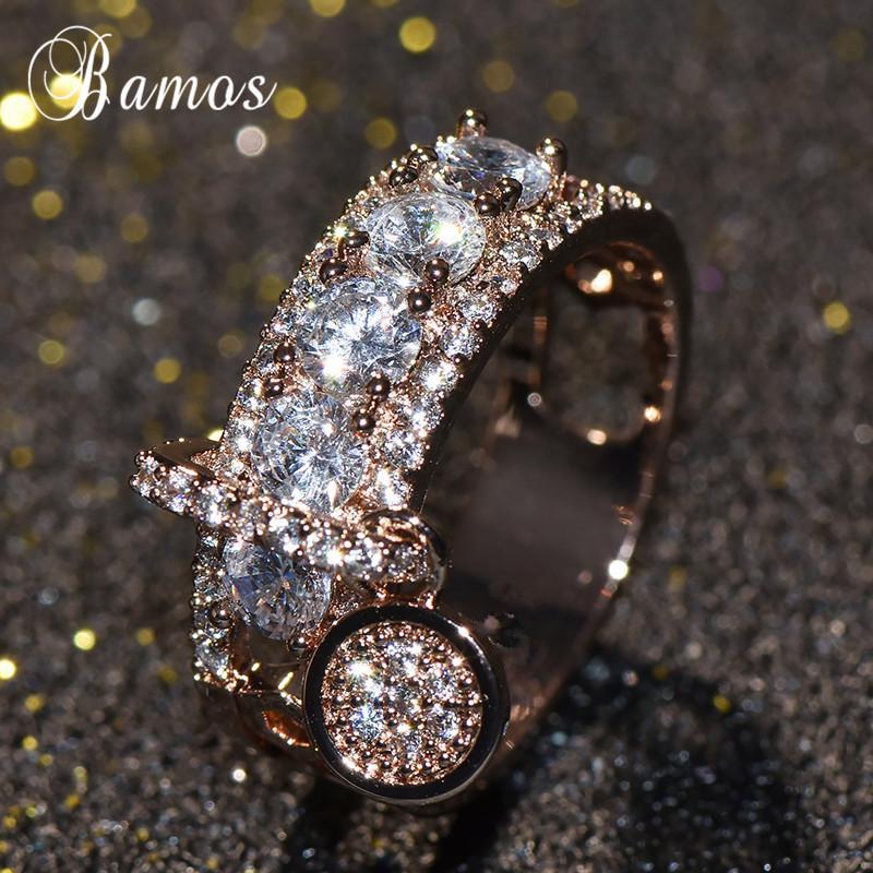 Массивное женское кольцо усыпанное кристаллами с подвеской