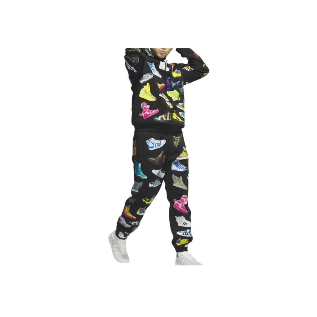 Adidas Оригинальные брюки Jeremy Scott Archive SS23 Archive, дышащие трикотажные спортивные брюки с манжетами, унисекс, черные IA0096