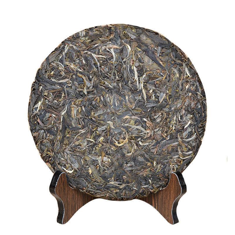 Чайный пирог Юньнань Пуэр Чайные листья старого дерева Чайный пирог Пуэр сырой чай 357г