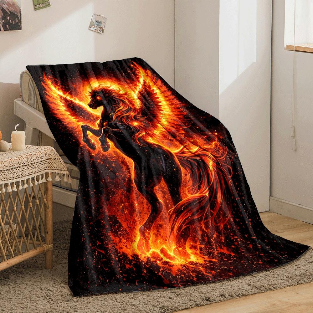 A fiery black-winged horse surrounded by flames and glowing embers. for all seasons blanket lunch break throw gift