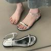 Flat-bottomed Silver Sandals for Women's Summer Wear 2025 New Versatile Skirt Metal Buckle One-word Beach Roman Shoes