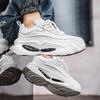 Модная повседневная мужская обувь с увеличением роста 2025 Весенний тренд моды Универсальная спортивная обувь на толстой подошве Модный тренд Массивные кроссовки