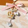 Exquisite Metal Crown Tassel Keyring With Stunning Crystal Embellishments Perfect For Special Occasions