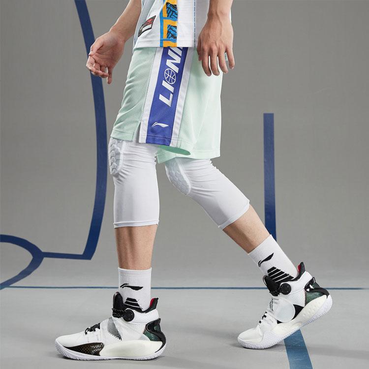 Спортивная серия Li Ning Баскетбольные свободные спортивные шорты Мужские шорты Зеленые AAPR351-5