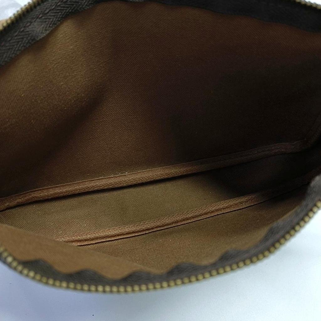 [Pre-Owned] Pochette Monogram Zip Closure PVC Handbag - Very Good #GB0OG4